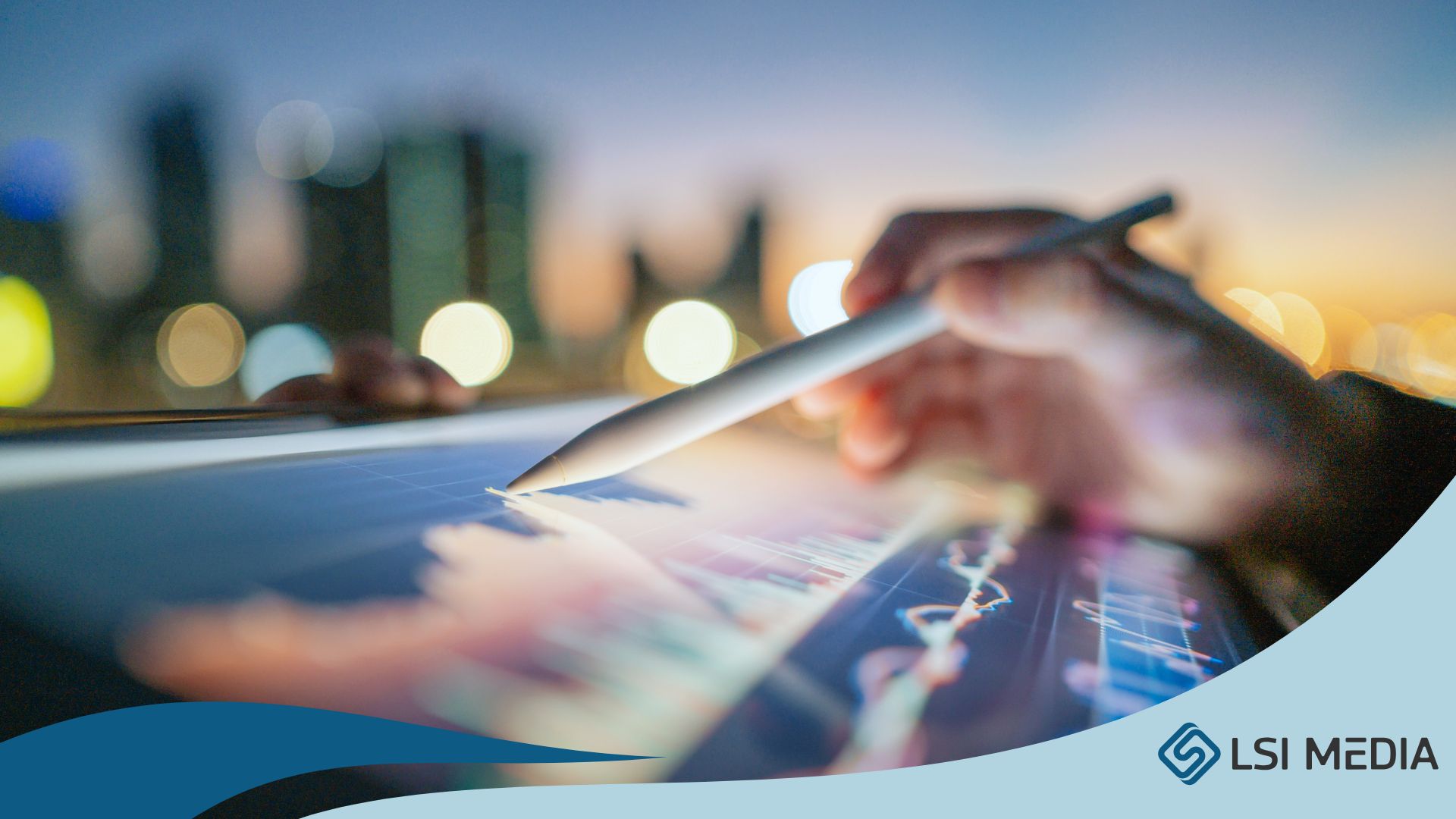 LSI Media Maximize ROI with Data-Driven Marketing Campaigns Featured Image LSI Media Maximize ROI with Data-Driven Marketing Campaigns Featured Image showing a hand holding a stylus over tablet displaying metrics with a blurred city background.